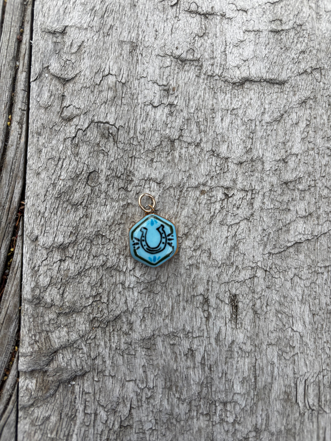 Shá Parlé Blue Horseshoe Hexagon Charm