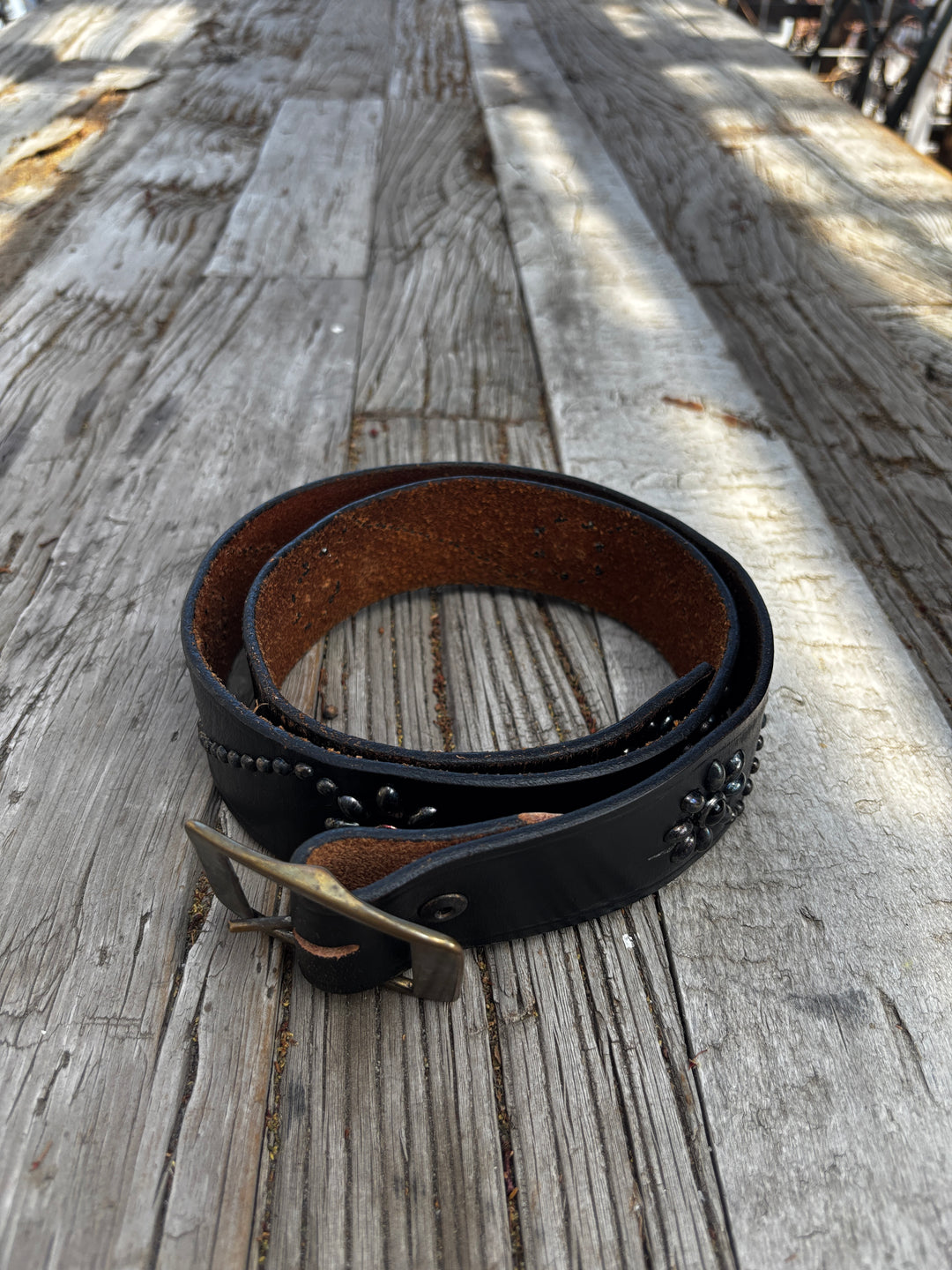 Old Stud Handmade Leather Belt Daisy Chain on Vintage Black