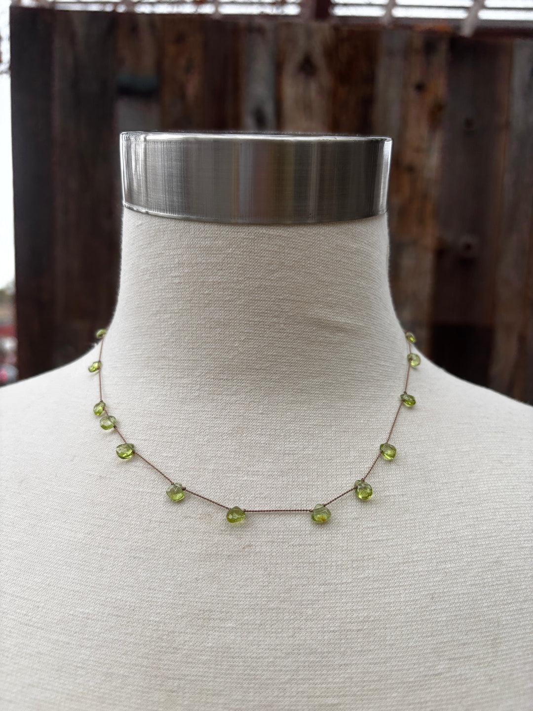 Eliabeth Nicole knotted Peridot on silk n178i