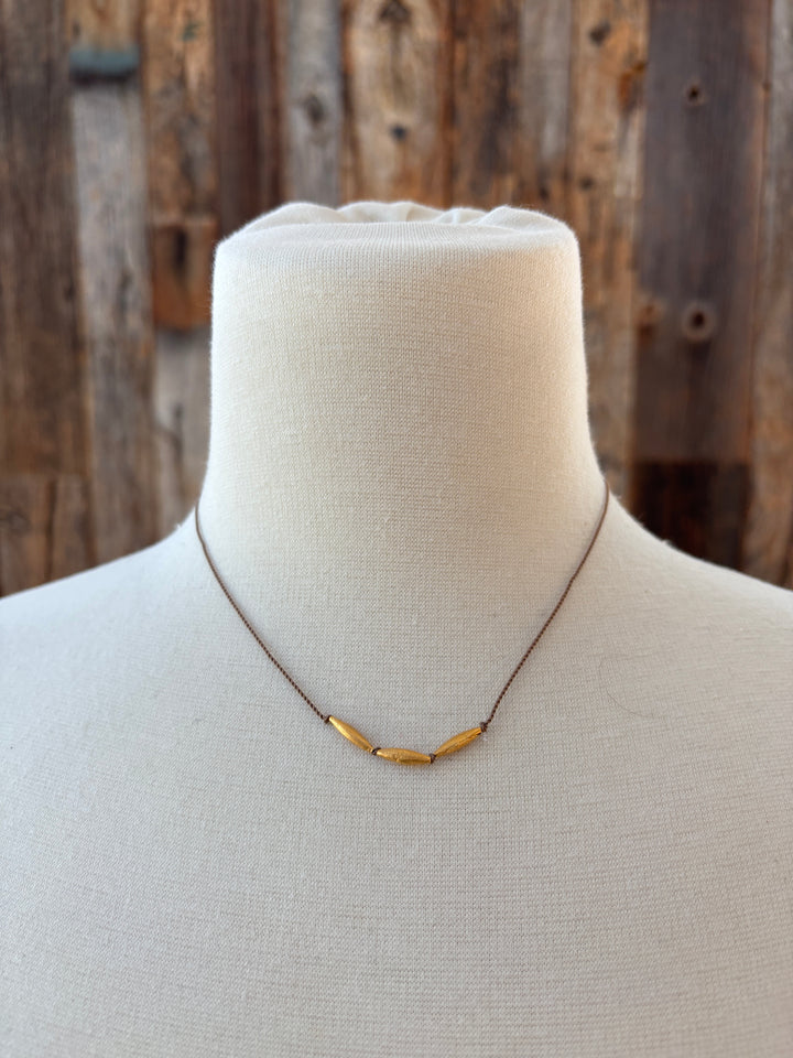 River Song Golden Rice Talisman Necklace