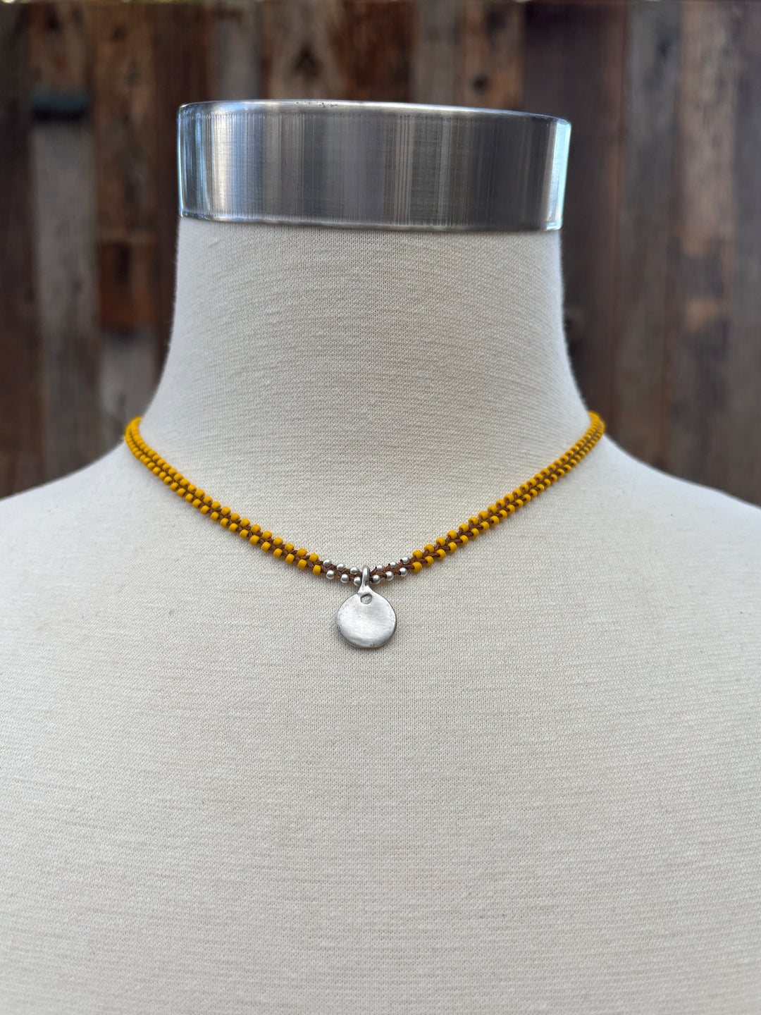 Minetta Design Sun Pendant on Sienna Cord Necklace