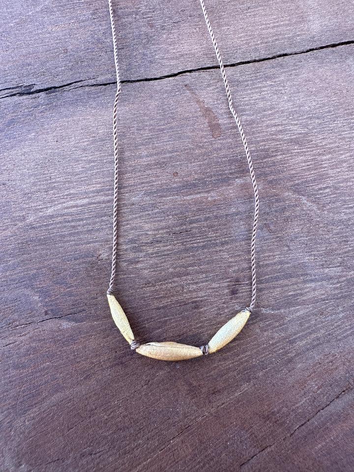River Song Golden Rice Talisman Necklace