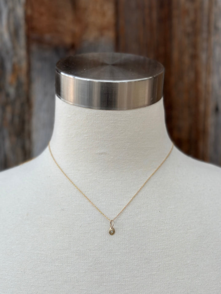 Robin M 14K Tiny Diamond Charm 1.5mm